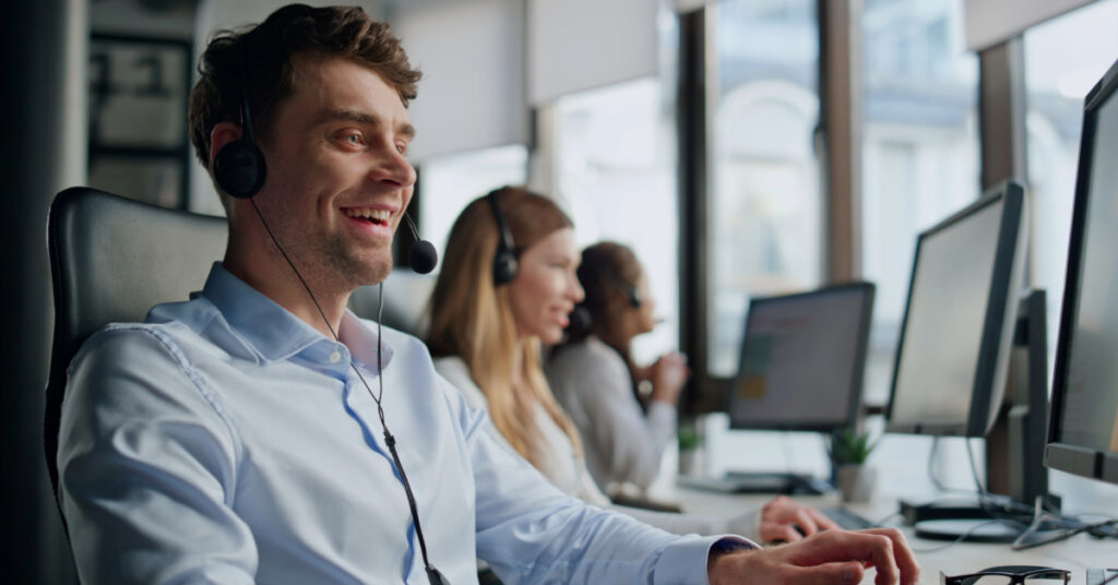 IT professional providing managed cybersecurity services in a modern office environment