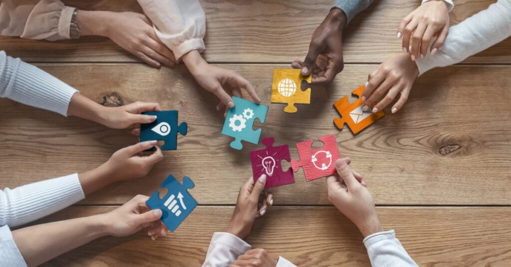 Lancaster SMB team connecting puzzle pieces to build stronger IT security habits together.