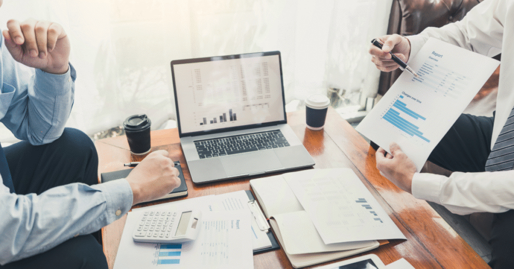 ONE 2 ONE team reviewing a cybersecurity risk assessment for a small business using the NIST framework.